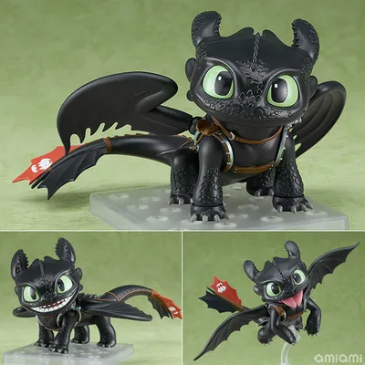 Figura articulada de Toothless negro con ojos verdes y accesorios de Cómo Entrenar A Tu Dragón