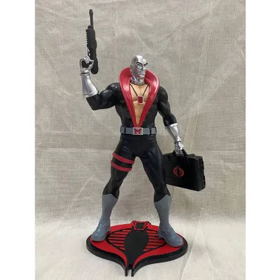 Figura Destro G.I. Joe con maletín negro y arma plateada