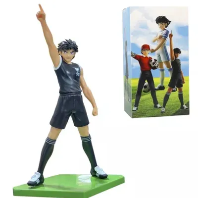 Figura Steve Hyuga SuperCampeones pose victoriosa puño levantado