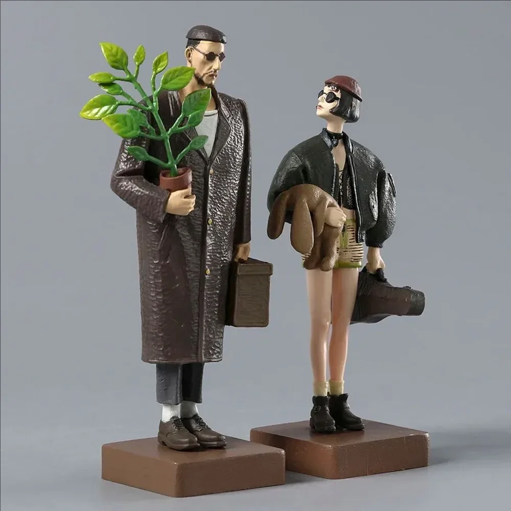 Figuras León el Profesional dúo de personajes con accesorios