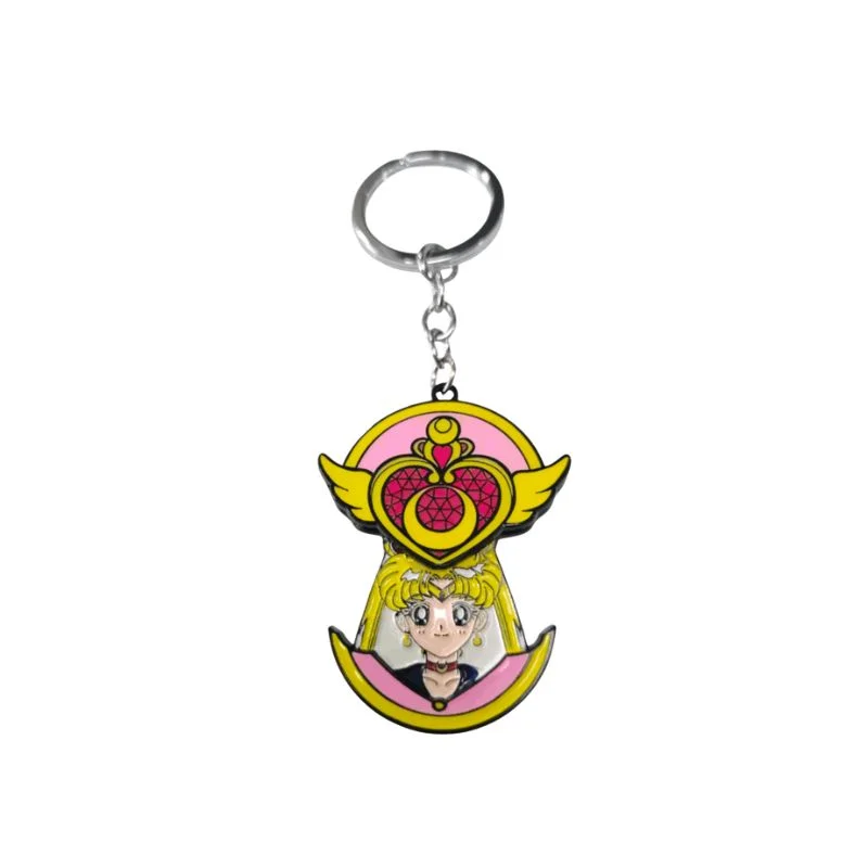 Llavero Sailor Moon con broche de corazón cósmico dorado y rosa