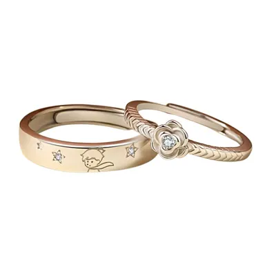 Set de dos anillos dorados El Principito con rosa y estrellas