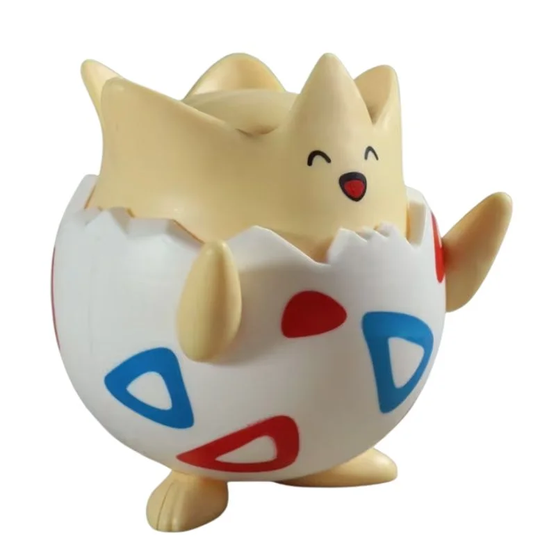 Figura Togepi Pokémon en huevo blanco con detalles rojos y azules